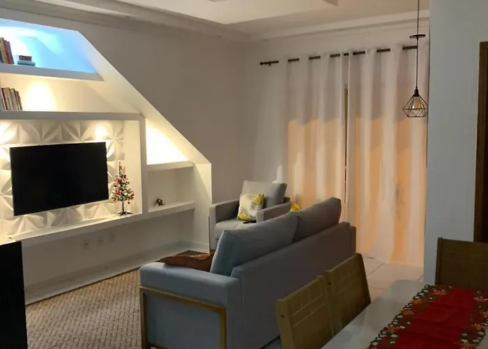 APARTAMENTO COM SUITE EM CONDOMÍNIO FECHADO com estacionamento próprio Porto Seguro